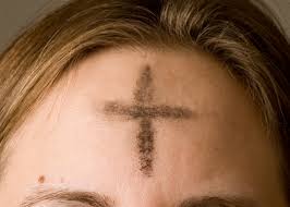 Ash cross on one's forehead, the symbol that is placed there on Ash Wednesday. 