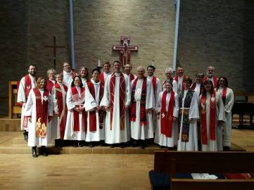 Scott is front and center among many colleagues and friends in ministry.