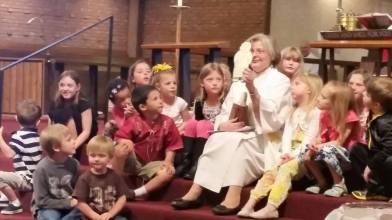 Pastor Diane Roth leading the Children's Sermon about "Flat Jesus." 