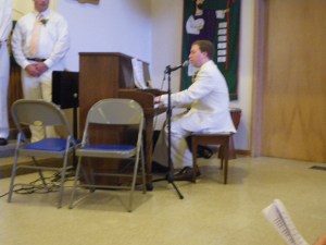 Singing on the piano.